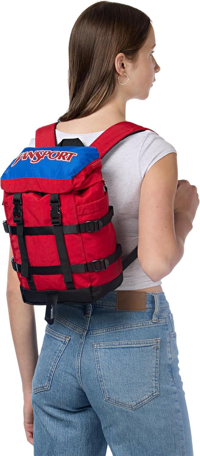 imageJanSport Mini Skip Pack Compact Backpack with Main Compartment Side Water Bottle Pocket and Zippered Accessory Pocket Jelly KellyRed Tape
