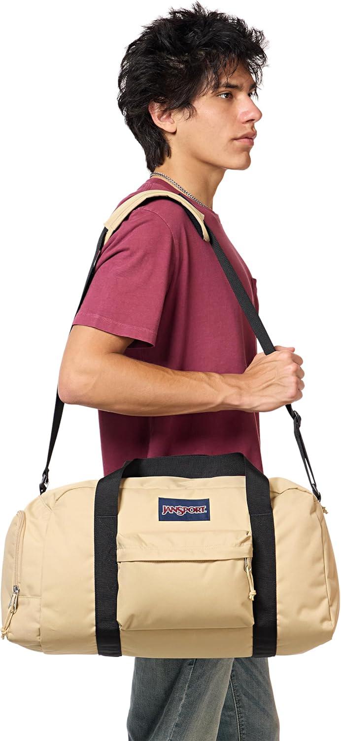 imageJanSport Weekender Duffel  Travel or Gym Bag Durable Weekender with Front Utility Pocket ampamp Side Grab HandlesTravertine